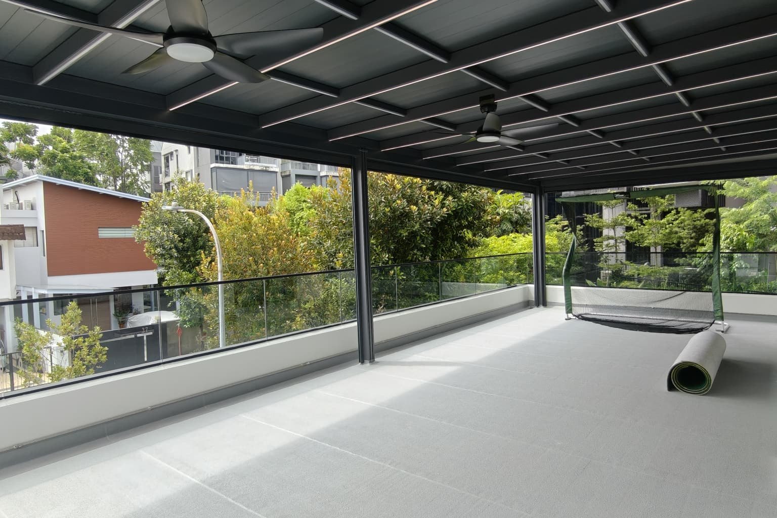 Covered aluminium roof terrace on a Singapore landed home